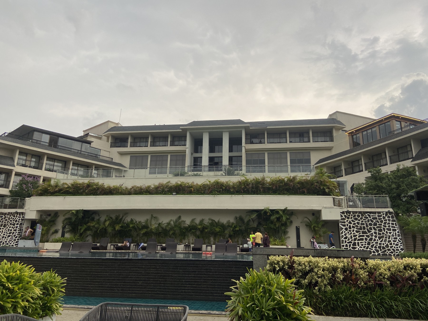 Pool and tiered facade of Courtyard by Marriott, Mahabaleshwar.