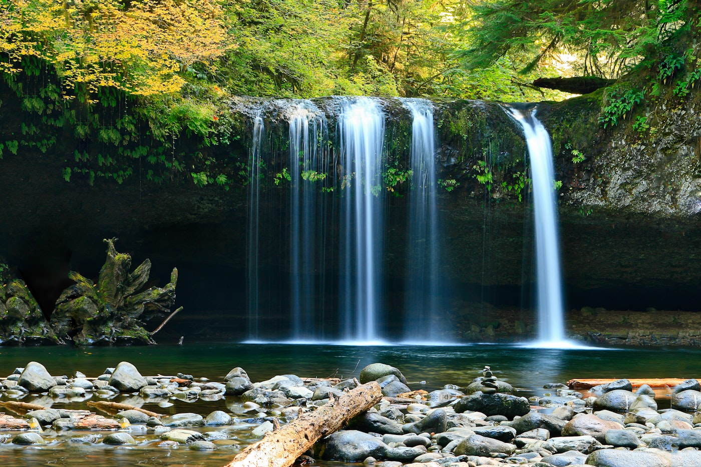 A charged battery and a waterfall, each showing how an uneven starting point can create movement.