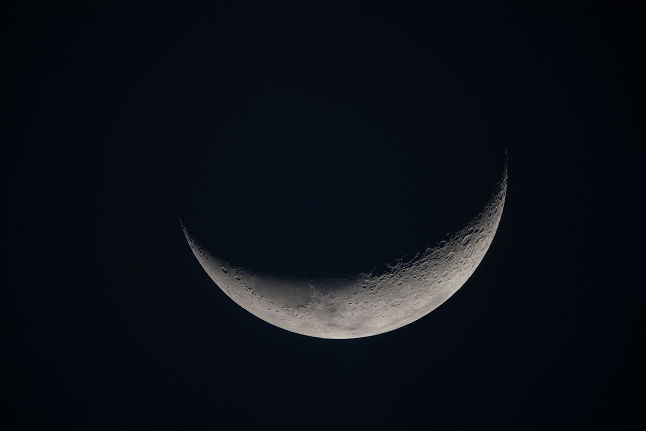 Crescent Moon photographed from space against a dark sky